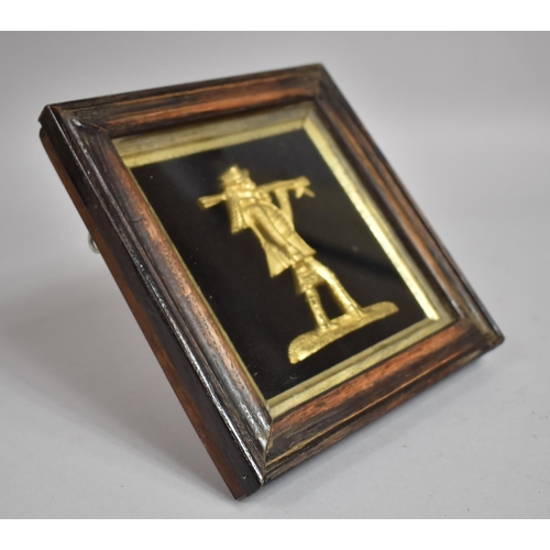 83 - A 19th Century Bronze Plaque of a Chimney Sweep Mounted in a Moulded Oak Frame. 18x18cms