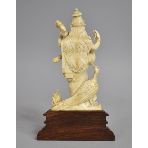 63 - A 19th Century Indian Carved Bone Figure of a Hindu Goddess Saraswati Mounted on a Hardwood Plinth, ... 