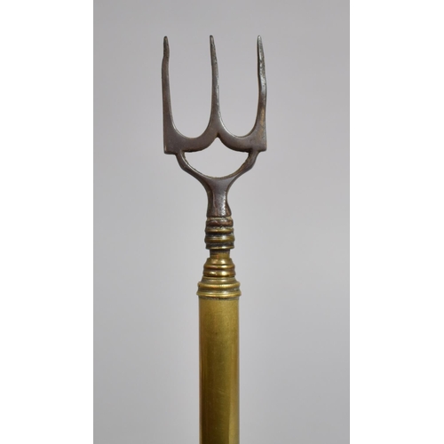 119 - An Early 19th Century Brass and Steel Telescopic Toasting Fork. 57cms Long Max.