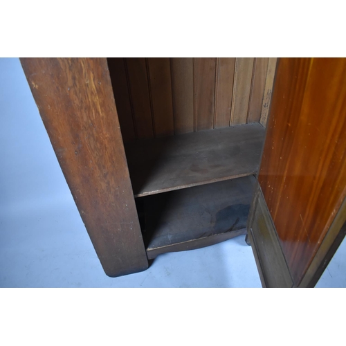 436 - An Arts and Crafts Oak Single Wardrobe with Mirror Front and Having Pressed Copper Rosettes and Hear... 