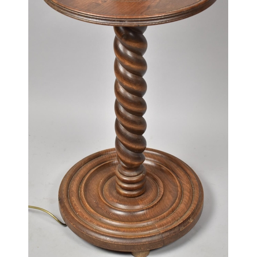 430 - An Edwardian Oak barley Twist Standard Lamp with Centre Circular Shelf and Circular Plinth Base