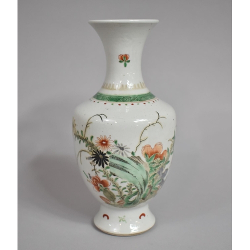 372 - A Chinese Famille Verte Vase, Kangxi Period, decorated with Blossoming Branches and Butterflies. 24.... 