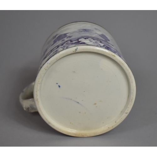 302 - An Early 19th Century Surprise Mug, Decorated with Purple Transfer, 9cms High