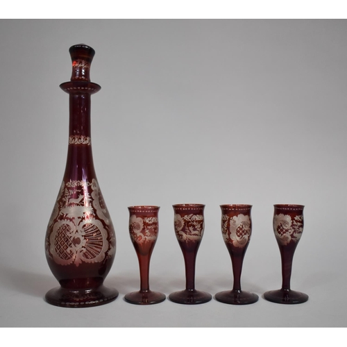 282 - A Bohemian Ruby Glass Cordial Set to Comprise Decanter and Four Liqueurs all with Acid Etched Decora... 