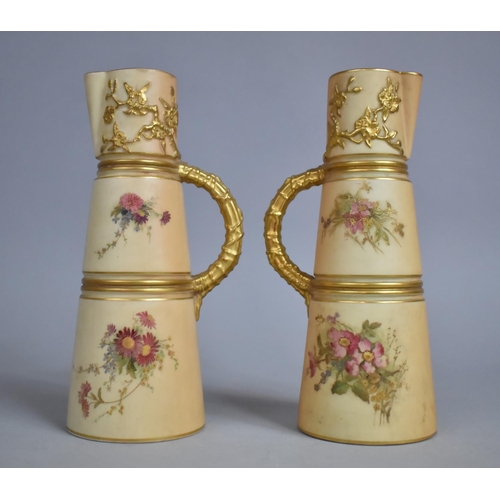 306 - A Pair of Royal Worcester Blush Ivory Ewer Jugs, Floral Hand Painted Decoration, Stylised Branch Han... 