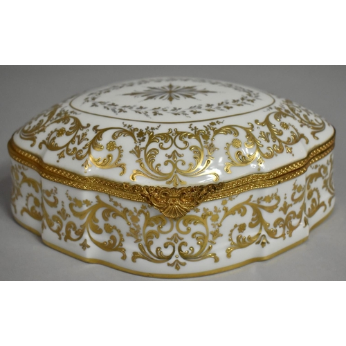 344 - A Limoges Porcelain Casket having Raised Gilt Foliate and Scrolled Decoration on White Ground, Gilt ... 