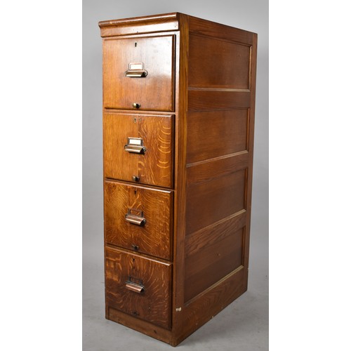 426 - An Edwardian Oak Four Drawer Filing Cabinet. 40x70x1345cm