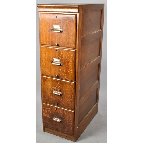 426 - An Edwardian Oak Four Drawer Filing Cabinet. 40x70x1345cm