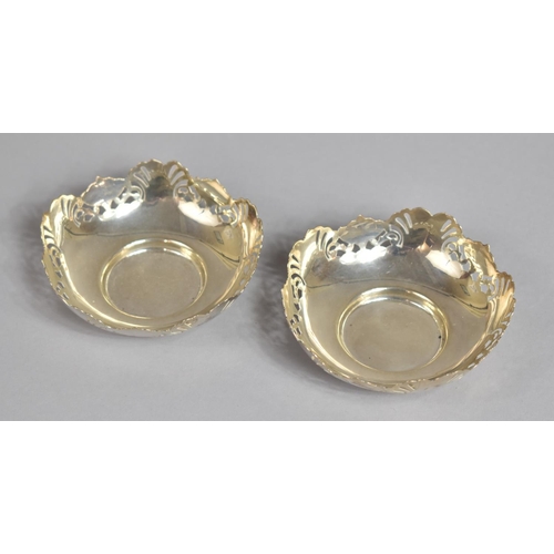 229 - A Pair of Silver Dishes with Pierced Decoration, Hallmark for 1944 E J Houlston. 82.3gms