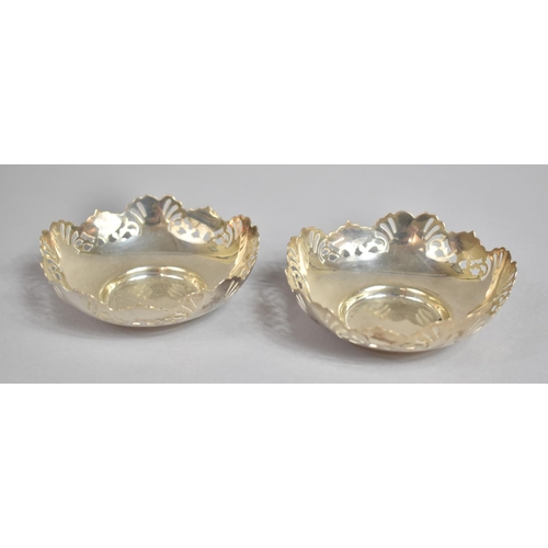 229 - A Pair of Silver Dishes with Pierced Decoration, Hallmark for 1944 E J Houlston. 82.3gms