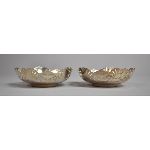 229 - A Pair of Silver Dishes with Pierced Decoration, Hallmark for 1944 E J Houlston. 82.3gms