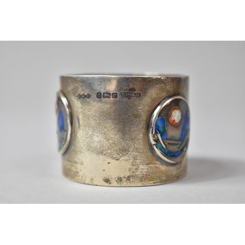 257 - A Liberty and Co Cymric Silver and Enamel Napkin Ring, Having Three Circular Organic Motif Designs. ... 