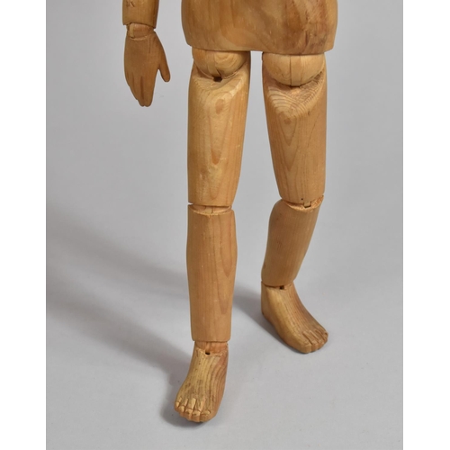 220 - An Artist's Softwood Lay Figure of Typical Form having Articulated Parts. 43cms