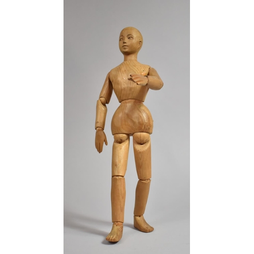 220 - An Artist's Softwood Lay Figure of Typical Form having Articulated Parts. 43cms