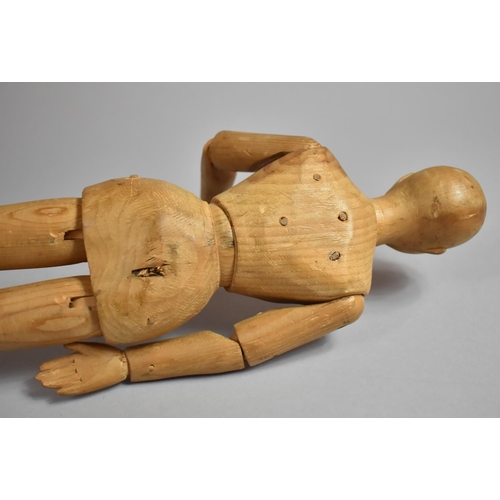 220 - An Artist's Softwood Lay Figure of Typical Form having Articulated Parts. 43cms