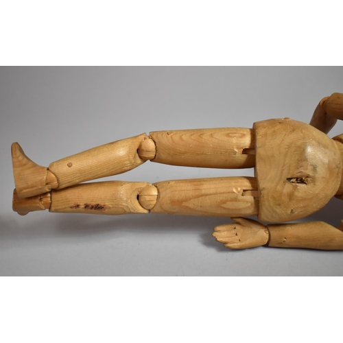 220 - An Artist's Softwood Lay Figure of Typical Form having Articulated Parts. 43cms