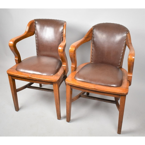 427 - A Near Pair of Edwardian Oak Office Chairs with Hide Seats and Backs