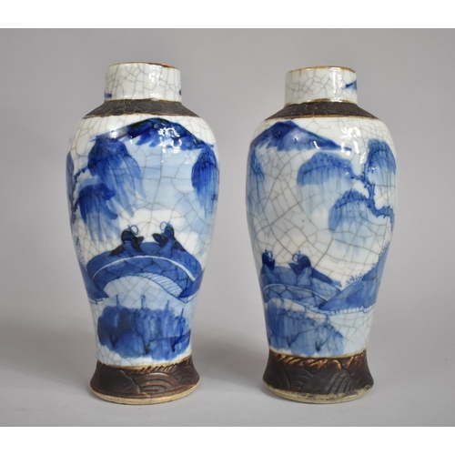 361 - A Pair of Chinese Blue and White Nanking Crackle Glazed Vases decorated with Figures, Oxidised Rims ... 