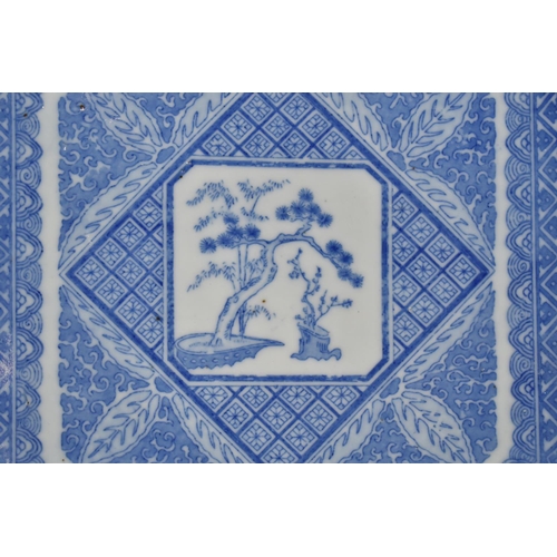 362 - A Japanese Blue and White Plate of Square Canted form Decorated with Central Blossoming Tree and Geo... 