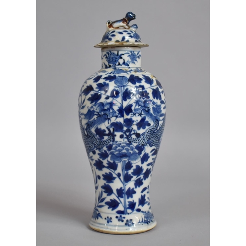 354 - A 19th Century Chinese Blue and White Lidded Baluster Vase Decorated with Dragons Amongst Foliage, F... 