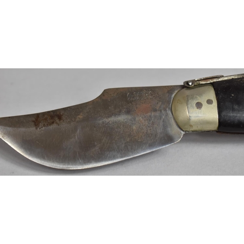 148 - A Spanish Horn Handled Folding Hunting Knife with Steel Blade Stamped for A Garcia, 20cms Long