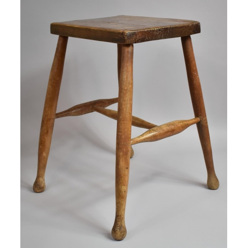 99 - A Late 19th/Early 20th Century Elm Topped Stool with Central Stretcher, 51cms High, 33x16.5cms Top