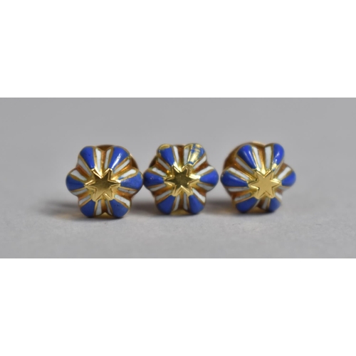 239 - A Set of Three Yellow Metal and Enamel Dress Studs having Central Star Surrounded by Six Petals in B... 