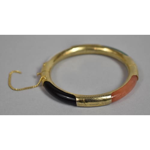 176 - A Gilt Metal Mounted Chinese Hardstone Hinged Bangle, with White and Spinach Jade, Onyx and Orange Q... 