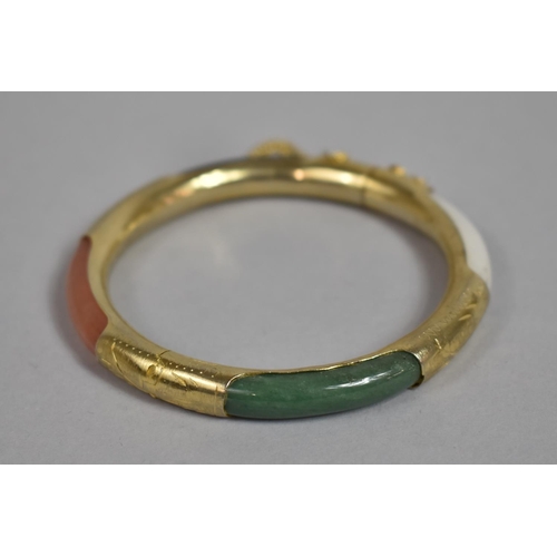 176 - A Gilt Metal Mounted Chinese Hardstone Hinged Bangle, with White and Spinach Jade, Onyx and Orange Q... 