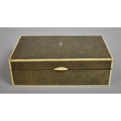 217 - An Art Deco Early 20th Century Shagreen Cigar/Cigarette Box with Ivory Edging. 17.5x10.5x5.5cms High