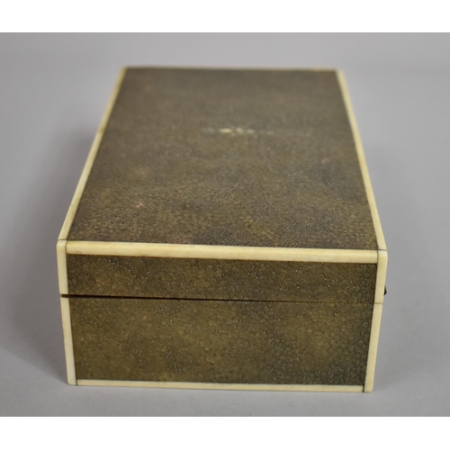 217 - An Art Deco Early 20th Century Shagreen Cigar/Cigarette Box with Ivory Edging. 17.5x10.5x5.5cms High