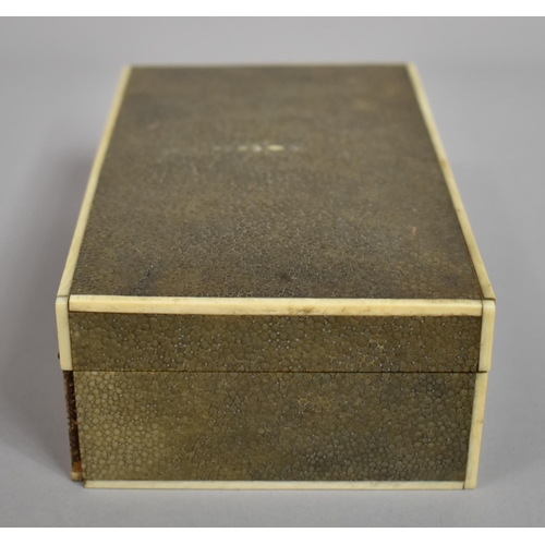 217 - An Art Deco Early 20th Century Shagreen Cigar/Cigarette Box with Ivory Edging. 17.5x10.5x5.5cms High