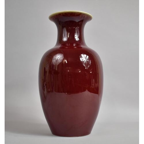 388 - A 19th Century Chinese Oxblood Vase of Baluster Form, 38cms High, Drilled to Base, Crazed to Inner R... 