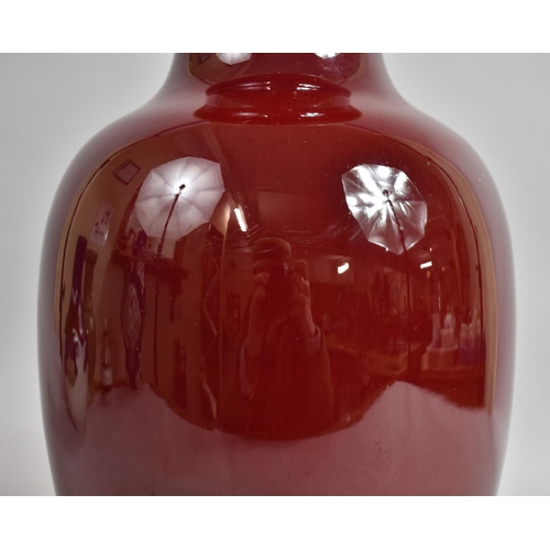 388 - A 19th Century Chinese Oxblood Vase of Baluster Form, 38cms High, Drilled to Base, Crazed to Inner R... 