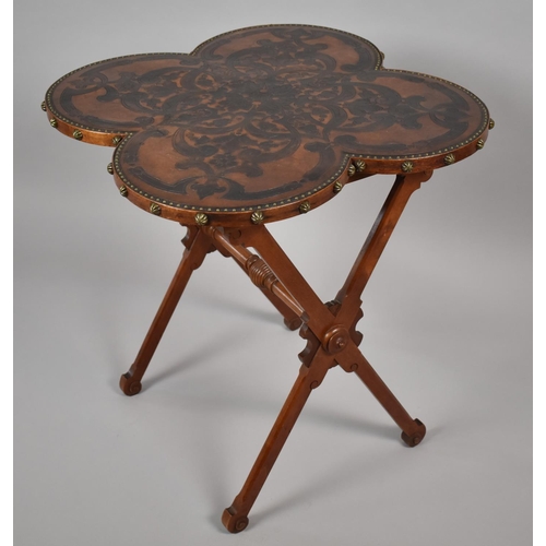 445 - A Nice Quality X Framed Occasional Table with Quatrefoil Tooled Leather Top. Brass Studs to Border. ... 