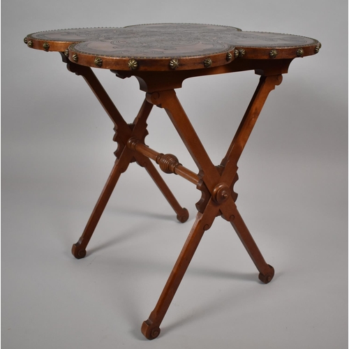 445 - A Nice Quality X Framed Occasional Table with Quatrefoil Tooled Leather Top. Brass Studs to Border. ... 