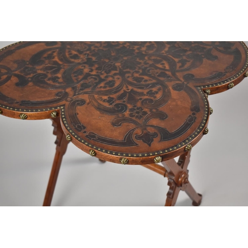 445 - A Nice Quality X Framed Occasional Table with Quatrefoil Tooled Leather Top. Brass Studs to Border. ... 