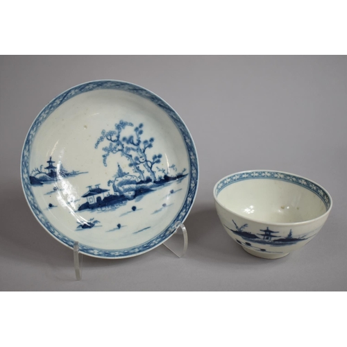 335 - An 18th Century Worcester Blue and White Teabowl and Saucer Decorated with Oriental Scene