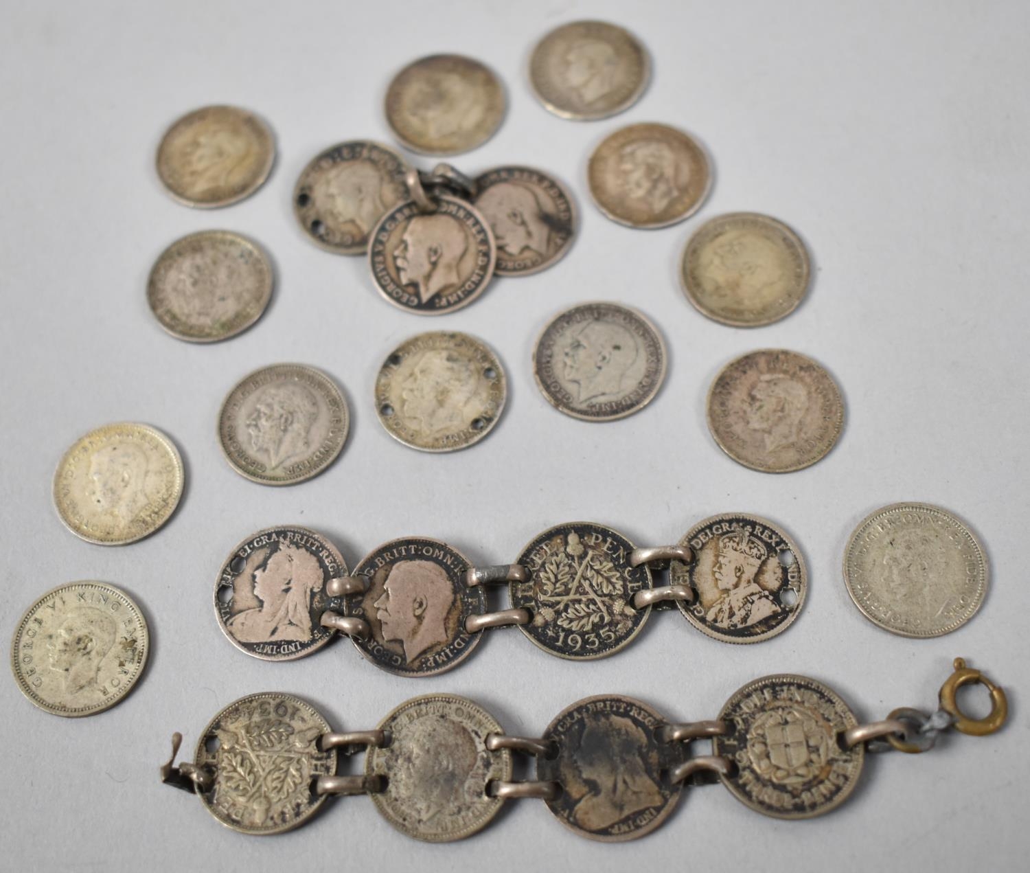 A Collection of Various Silver Threepenny "Joeys"