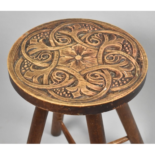 An Edwardian Carved Oval Topped Four Legged Stool 45cm high