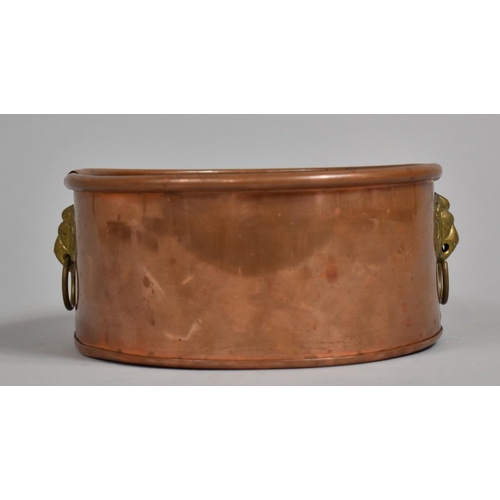 32 - A Circular Copper Planter with Brass Lion Mask Handles, 20cm Diameter