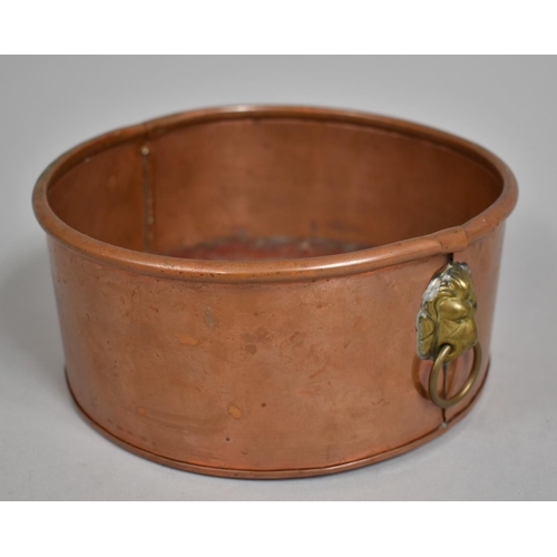 32 - A Circular Copper Planter with Brass Lion Mask Handles, 20cm Diameter