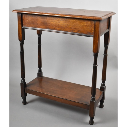 63 - An Edwardian Mahogany Narrow Hall Table of Rectangular Form, with Turned Supports