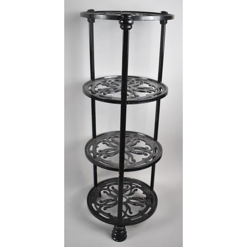 67 - A Modern Enamelled Circular Four Section Cast Metal Saucepan Stand, 70cm high