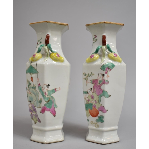 335 - A Pair of Chinese Porcelain Vases of Hexagonal Form decorated in the Famille Rose Palette with Figur... 