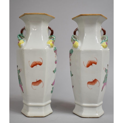 335 - A Pair of Chinese Porcelain Vases of Hexagonal Form decorated in the Famille Rose Palette with Figur... 