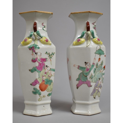 335 - A Pair of Chinese Porcelain Vases of Hexagonal Form decorated in the Famille Rose Palette with Figur... 