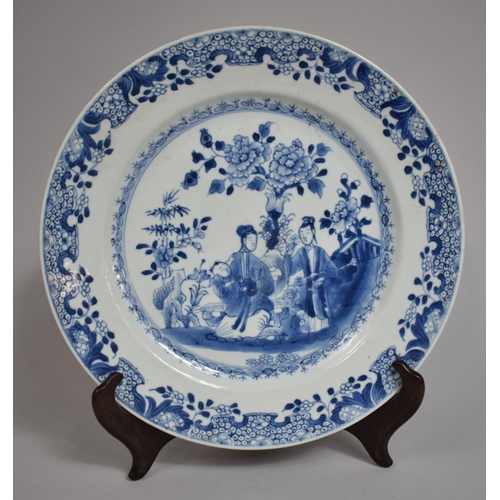 313 - An 18th/19th Century Chinese Blue and White Export Plate decorated with Family Scene in Exterior Loc... 