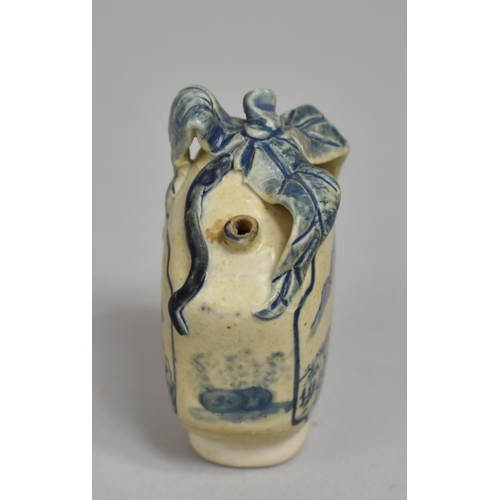 316 - A Small Chinese Blue and White Water Dropper Bottle with Stylised Leaf Finial and Decorated with Ext... 