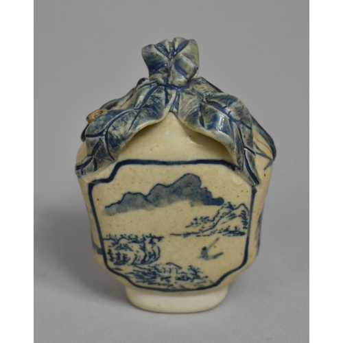 316 - A Small Chinese Blue and White Water Dropper Bottle with Stylised Leaf Finial and Decorated with Ext... 